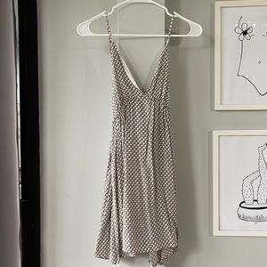 Sun dress with adjustable straps and tie that goes around the back